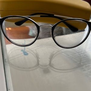 Black circle shape: prescription glasses